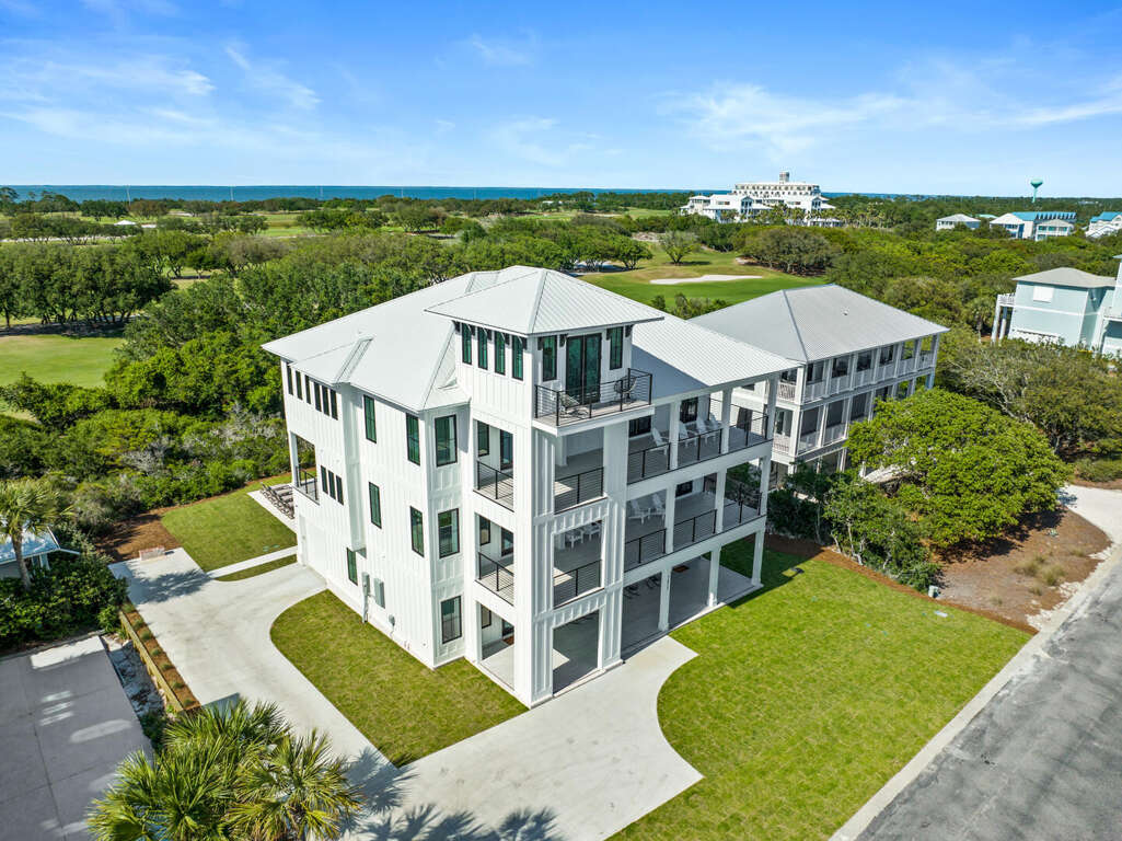 Multi-story coastal home with observation tower and covered porches, structural engineering by J. Martin Pitts, PE, Gulf Coast, AL